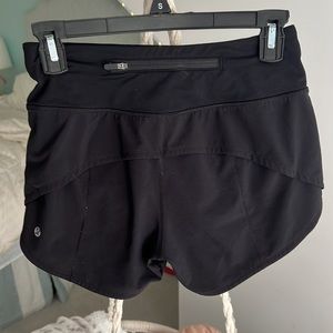 size 2 black lululemon speed up shorts(mid rise)